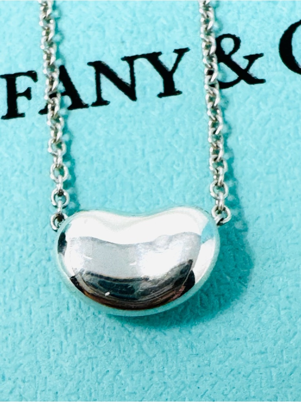 Tiffany & Co. Elsa Peretti Mini Bean Pendant Necklace.